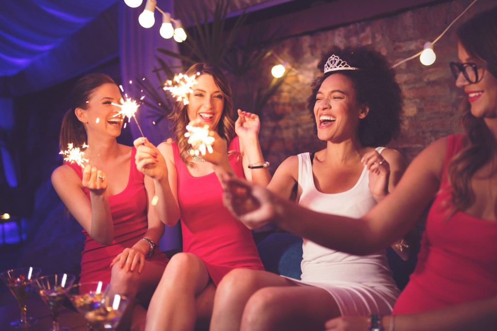 An Image of four bridesmaids enjoying a night out.